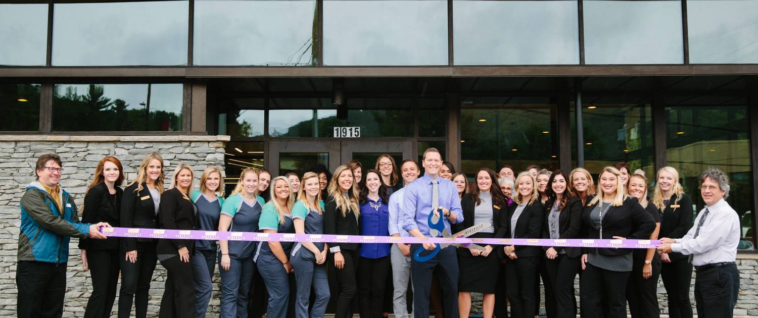 BRO team outside the new orthodontist office in Asheville