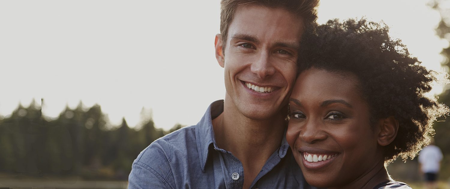 Couple getting treated with Invisalign in Asheville, NC