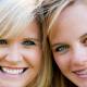 Teen with ceramic braces smiling for picture in Asheville