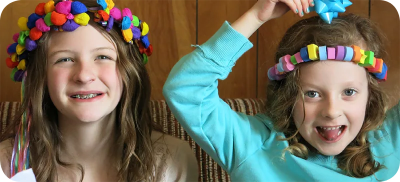 two kids with headbands