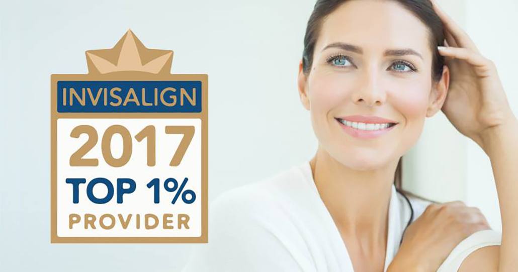 Invisalign award with woman smiling