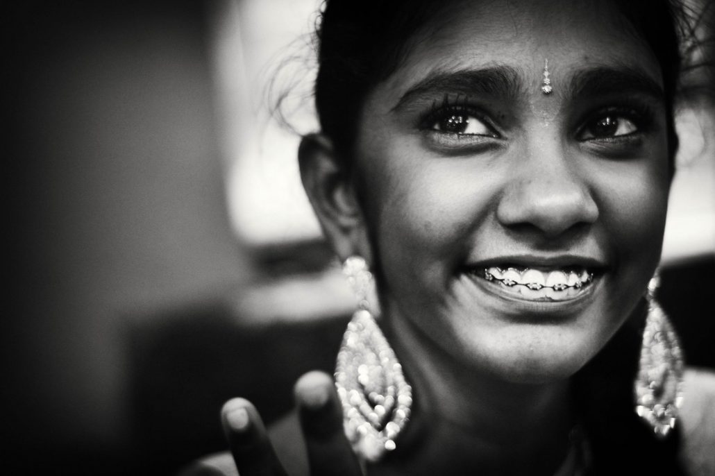 Young girl with braces flashes a beautiful smile for her profile picture