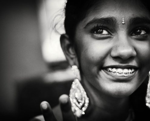 Young girl with braces flashes a beautiful smile for her profile picture