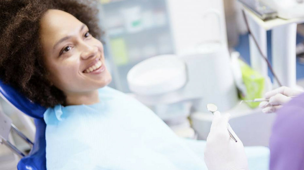 Woman comes in for oral surgery consultation in Asheville, NC