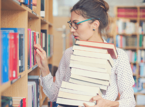 Woman uses her library card in Asheville