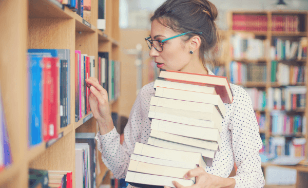 Woman uses her library card in Asheville