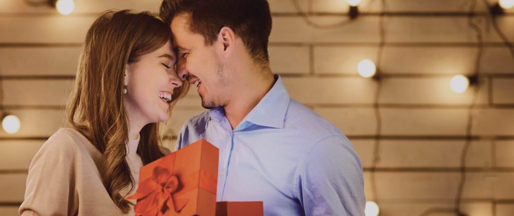 Couple enjoying the benefits of a free teeth whitening in Asheville, NC