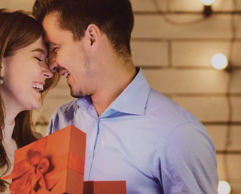 Couple enjoying the benefits of a free teeth whitening in Asheville, NC