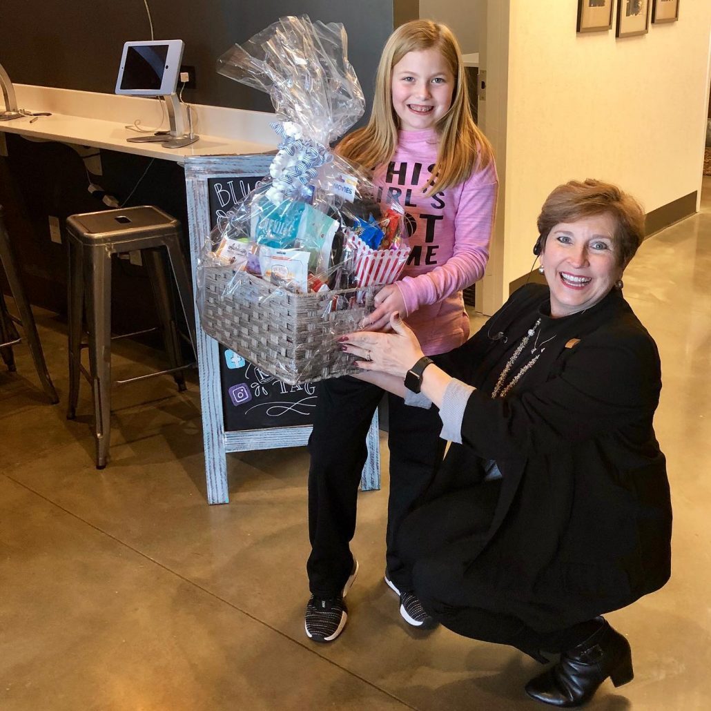 Girl in Hendersonville who won Movie Night Contest from Blue Ridge Orthodontics