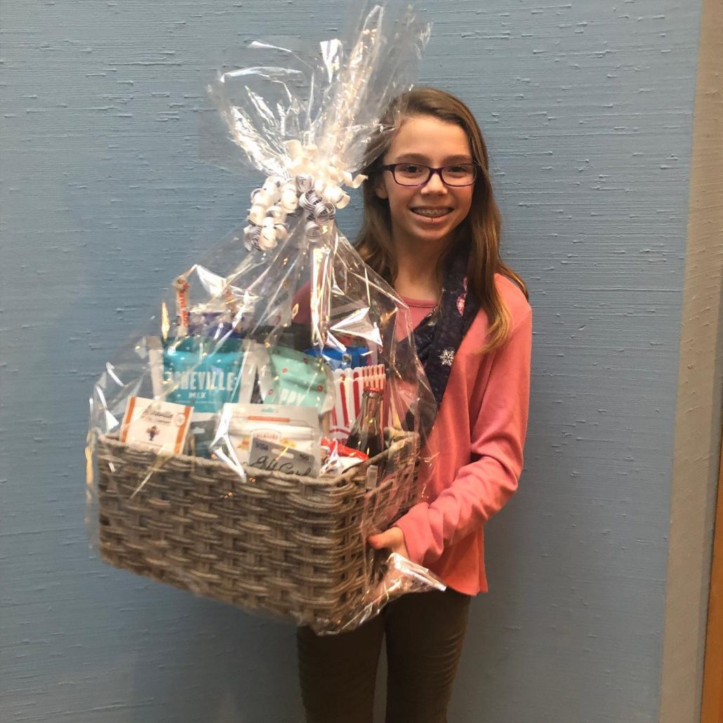 Girl in Asheville who won Movie Night Contest from Blue Ridge Orthodontics