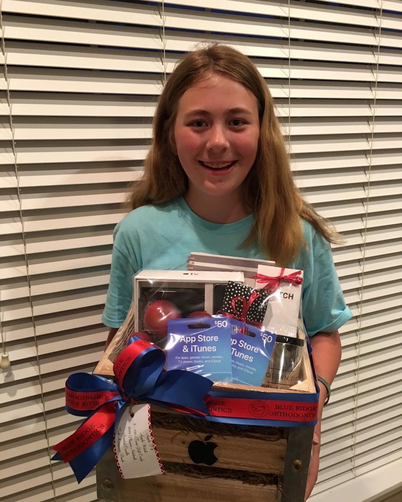Young girl wins Apple gift basket in Asheville
