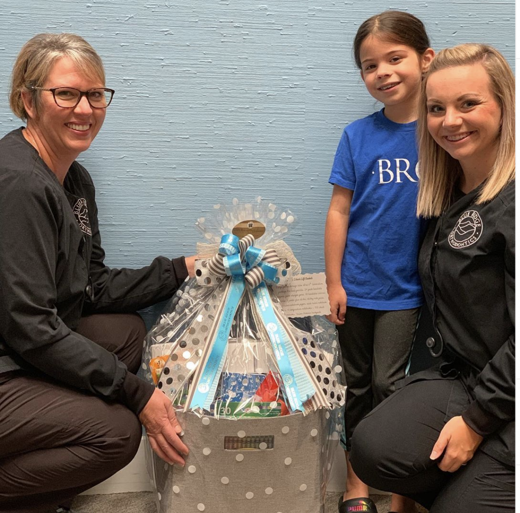 Young girl who won back to school gift basket from BRO