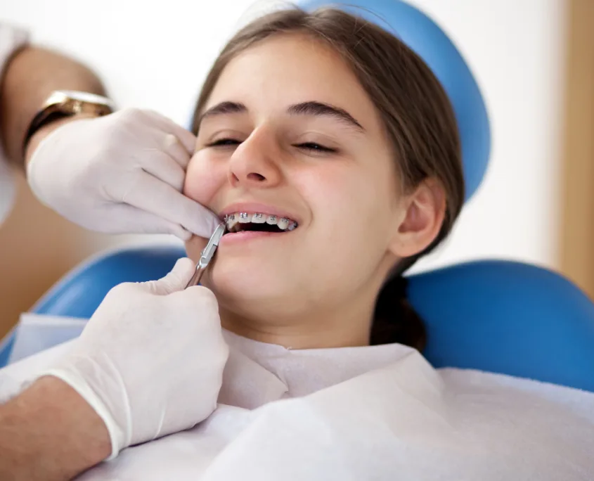The Big Reveal: What to Expect When Getting Your Braces Removed 3 Expectations for Getting Your Braces Removed - young girl getting her braces off