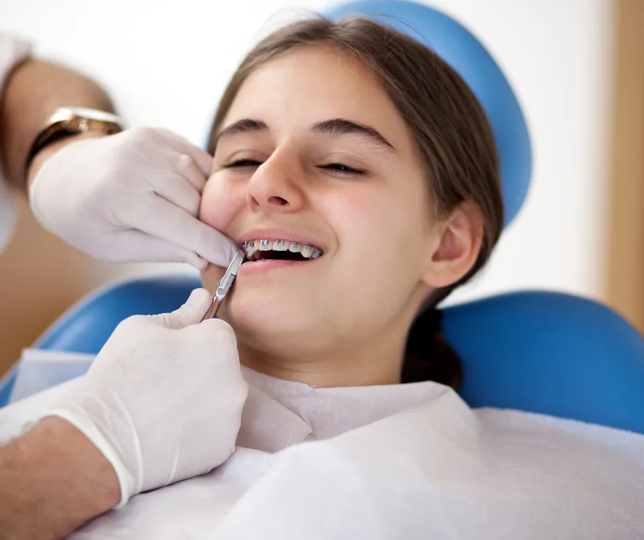 Expectations for Getting Your Braces Removed - young girl getting her braces off