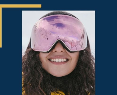 Long-term Benefits of Straight Teeth - girl skiing with straight teeth